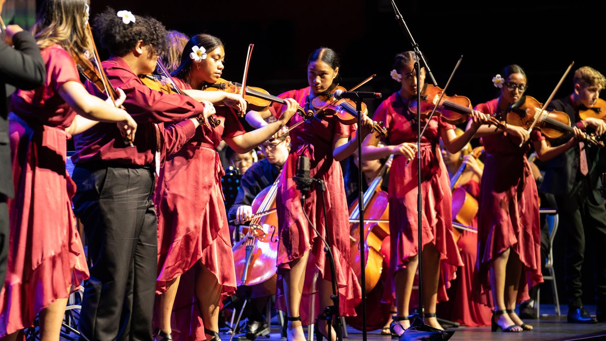Te Ata Festival: Sinfona for Hope image with children playing violin. New Zealand Festival of the Arts 2020