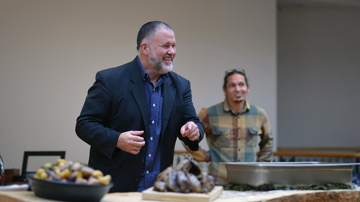 Ron Bull, Senior Lecturer at Otago Polytechnic and artist Simon Kaan at a Kaihaukai performance at the opening of Alex Monteith’s exhibition Kā paroro o haumumu: Coastal Flows / Coastal Incursions at Dunedin Public Art Gallery, 31 May 2019. Photo by Justin Spears. Courtesy of Dunedin Public Art Gallery.